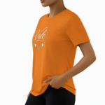 Woman wearing a "Vale" brand floral graphic t-shirt in breathable cotton, available in Forest Green, Olive, and Sand Beige colors.