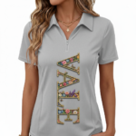 Women's quarter-zip polo shirt in breathable pique cotton featuring a vertical floral 'VALE' graphic design.