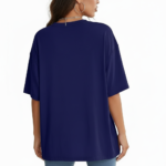 Woman wearing a breathable cotton oversized t-shirt with "Sunshine and Beach" yellow graphic print, available in navy blue, maroon, and red.