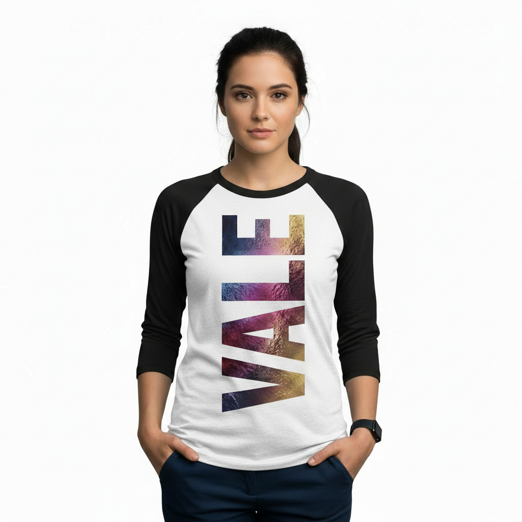 Person wearing a 3/4 sleeve raglan cotton shirt featuring a vertical VALE galaxy-textured graphic print.