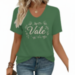 A woman wearing a breathable cotton V-neck T-shirt with a "Vale" butterfly graphic design, available in brown, green, and grey.