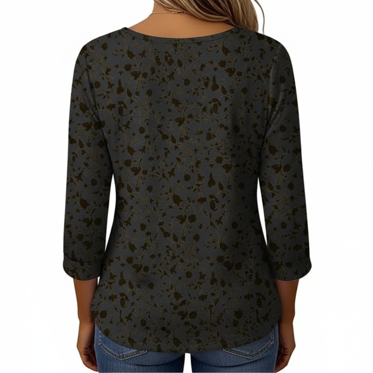 Women's breathable floral cotton blouse with VALE gold embroidery and pleated button-front design.
