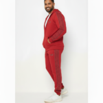 Men's premium cotton zip-up tracksuit featuring a hooded sweatshirt and matching joggers with geometric side-stripe detailing and VALE logo.