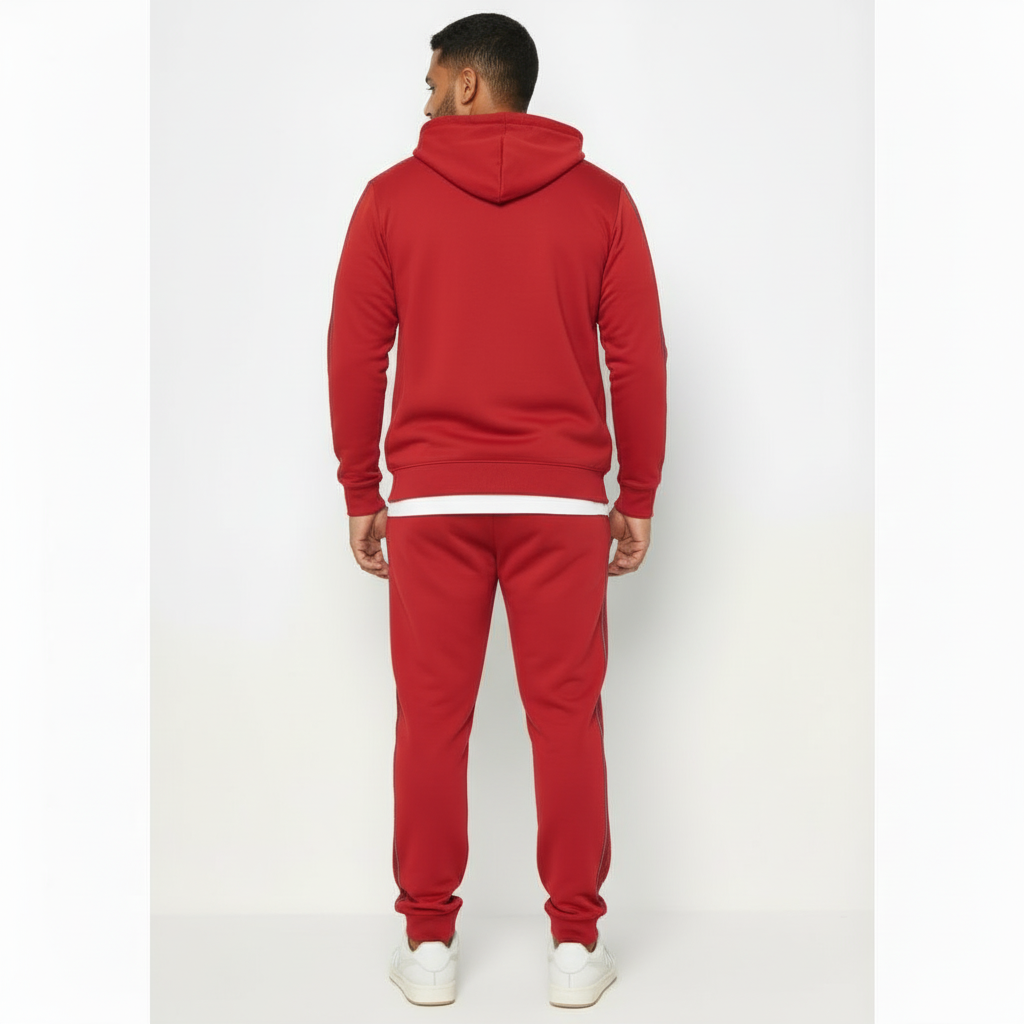 Men's premium cotton zip-up tracksuit featuring a hooded sweatshirt and matching joggers with geometric side-stripe detailing and VALE logo.