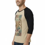 Man wearing a VALE Art Deco graphic raglan shirt made of breathable cotton with 3/4 sleeves.