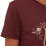 Women's 100% cotton breathable t-shirt with gold floral Vale graphic design, shown in Navy Blue, Maroon, and Green.