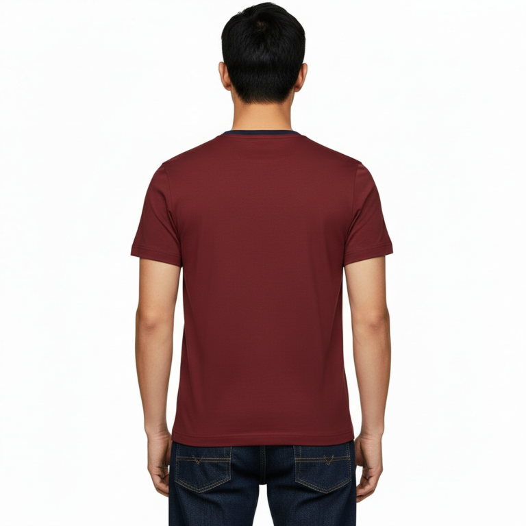 Close-up of a man wearing a VALE branded 100% cotton breathable slim-fit t-shirt with a horizontal chest stripe, available in grey, white, and maroon.