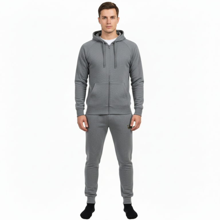 Rear and front view of a man wearing a VALE brand cotton tracksuit featuring a gold-foil vintage car and tree branch design on the back and vertical logo on the leg, shown on a white background.