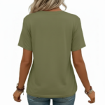 A woman wearing a breathable cotton V-neck t-shirt with a floral "Vale" graphic design, available in orange, khaki, and olive green colors.