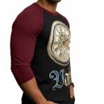 Close-up of a man wearing a breathable cotton raglan shirt featuring a vintage steampunk clockwork design and gothic 'Vale' text, athletic fit 3/4 sleeves.
