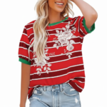 Women's breathable cotton striped t-shirt with floral rose print and green contrast trim, styled with denim jeans.