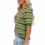 A smiling model wearing a breathable VALE brand cotton t-shirt with horizontal stripes, featuring a central butterfly graphic design and puff sleeves, paired with light-wash distressed denim jeans against a clean white background.