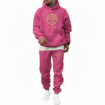 Men's oversized 2-piece tracksuit featuring a breathable cotton hoodie and joggers with gold VALE Tree of Life compass logo, available in Mocha Brown, Sand Beige, and Fuchsia Pink.