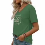 A woman wearing a breathable cotton V-neck T-shirt with a "Vale" butterfly graphic design, available in brown, green, and grey.