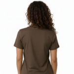 Woman wearing a breathable cotton t-shirt with "Vale" gold script calligraphy design, available in brown, olive green, and maroon.