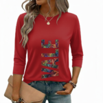A woman wearing a breathable 3/4 sleeve cotton t-shirt with a colorful vertical "VALE" graphic print, available in cream, red, and black