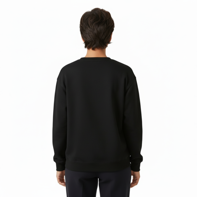 Person wearing a VALE graphic cotton sweatshirt featuring botanical leaves, acorns, and stars in Black, Forest Green, and Burnt Orange colors.