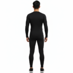 Front view of a man wearing a VALE brand 2-piece compression suit with a gold supercar graphic on the long-sleeve shirt and leggings, available in olive green, navy blue, and maroon.