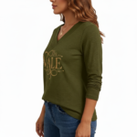 Women wearing a VALE branded long-sleeve breathable cotton V-neck t-shirt in navy blue, mustard yellow, and olive green, paired with blue jeans.