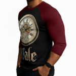 Close-up of a man wearing a breathable cotton raglan shirt featuring a vintage steampunk clockwork design and gothic 'Vale' text, athletic fit 3/4 sleeves.