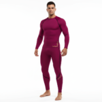 Front view of a man wearing a VALE brand long-sleeve compression shirt and matching leggings set in breathable fabric, available in white, navy blue, and maroon.