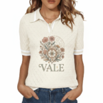 Women's VALE botanical graphic knit polo shirt in breathable pique cotton, featuring diamond texture and vintage floral compass design.