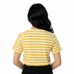 Young woman wearing a VALE brand horizontal striped breathable cotton t-shirt in blue, yellow, and green colors.