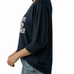 Women's breathable cotton scoop neck shirt featuring a floral 'VALE' graphic and smocked 3/4 sleeves, available in Charcoal, Navy, and Green.