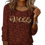 Women's breathable floral cotton blouse with VALE gold embroidery and pleated button-front design.