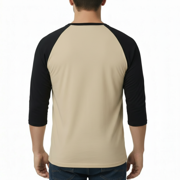 Man wearing a VALE Art Deco graphic raglan shirt made of breathable cotton with 3/4 sleeves.