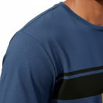 Man wearing a slim-fit breathable cotton t-shirt featuring a geometric "LOVE" compass graphic design on the chest with a horizontal stripe and pocket.