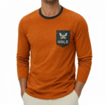 Men's VALE long-sleeve breathable cotton ringer shirt with butterfly embroidered pocket, athletic fit, available in orange, grey, and blue.