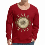 "Man wearing a VALE brand long sleeve cotton shirt featuring a vintage gold nautical compass graphic on the chest, available in black, forest green, and burgundy."