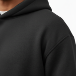 A man wearing a premium breathable cotton tracksuit featuring a colorful watercolor tree graphic with "VALE" text on the back, available in Black, Burgundy, and Sand.