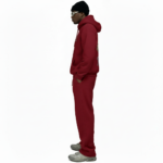 Men's 2-piece breathable cotton performance tracksuit featuring a quarter-zip long-sleeve shirt and joggers with contrast side panels and gold VALE compass logo, available in Black, White, Blue, and Red.