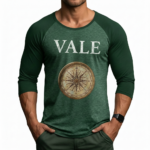 Men's 3/4 sleeve raglan baseball shirt in breathable cotton featuring a vintage VALE text and nautical compass graphic, athletic slim fit.