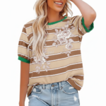 Women's breathable cotton striped t-shirt with floral rose print and green contrast trim, styled with denim jeans.