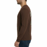 Back view of a man wearing a VALE graphic long-sleeve cotton shirt featuring a vintage gate design and Roman numerals MCMXCIX.
