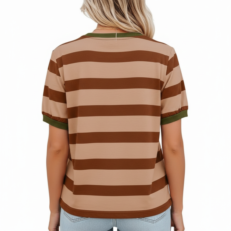 A woman wearing a breathable cotton striped t-shirt featuring a white rose wreath graphic and contrast green neckline, paired with blue denim.