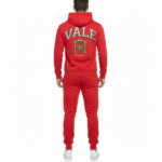 Men's breathable cotton tracksuit set showing a large varsity VALE back graphic with a gate emblem and Roman numerals on the hoodie and joggers.