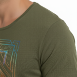 Man wearing VALE brand Art Deco graphic t-shirt in breathable cotton, available in white, olive green, and royal blue, athletic slim fit style.