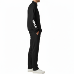 Men's two-piece breathable cotton tracksuit featuring a full-zip mock neck jacket and joggers with VALE sleeve branding, available in Black, Forest Green, and Burgundy.