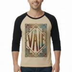 Man wearing a VALE Art Deco graphic raglan shirt made of breathable cotton with 3/4 sleeves.