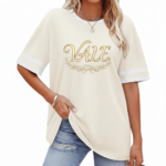 Woman wearing VALE graphic cotton t-shirt with striped sleeves and laurel wreath design in Blue, Plum, and Cream colors.