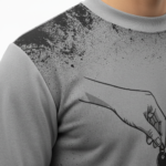 Full-body studio mockup of a man wearing a VALE brand breathable cotton tracksuit featuring a hand-passing-a-key graphic and ink-splatter design, available in grey, brown, and white-black contrast.