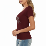 Slim-fit women's ribbed cotton t-shirt featuring a silver "Vale" butterfly graphic, available in burgundy, black, and orange.