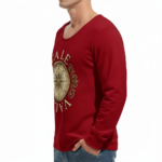 "Man wearing a VALE brand long sleeve cotton shirt featuring a vintage gold nautical compass graphic on the chest, available in black, forest green, and burgundy."