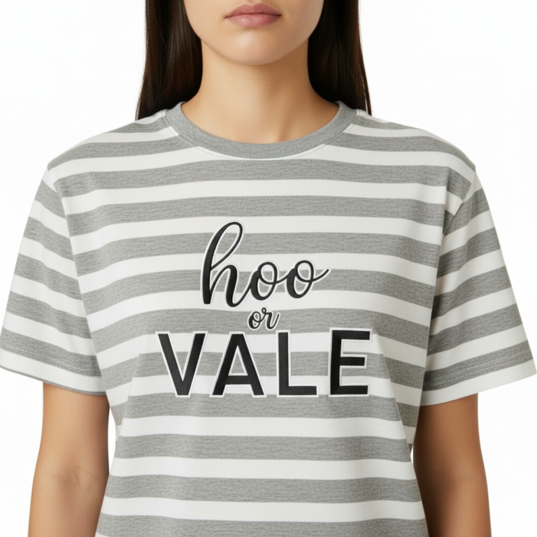 A person wearing a breathable cotton striped t-shirt with "hoo or VALE" graphic print, available in blue, grey, and brown stripes.