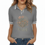 Women's VALE botanical graphic knit polo shirt in breathable pique cotton, featuring diamond texture and vintage floral compass design.