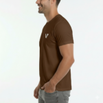 Front view of a man wearing a breathable cotton slim-fit t-shirt with a small white minimalist V-logo on the chest, available in navy, brown, and olive.